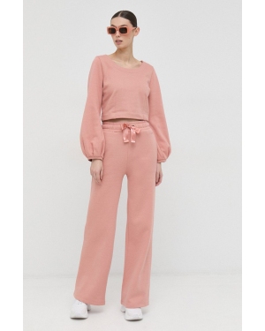 Guess spodnie dresowe bawełniane damskie kolor różowy