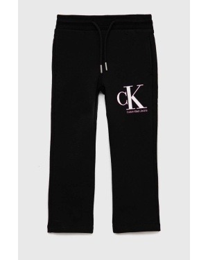 Calvin Klein Jeans spodnie dresowe dziecięce kolor czarny wzorzyste