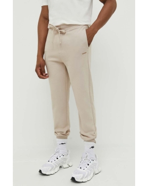 HUGO spodnie dresowe bawełniane kolor beżowy gładkie 50489617