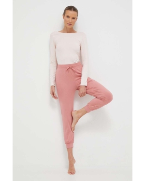 Roxy spodnie do jogi Naturally Active kolor różowy gładkie