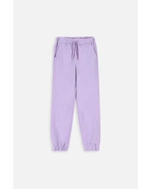 Coccodrillo spodnie dresowe bawełniane dziecięce kolor fioletowy gładkie