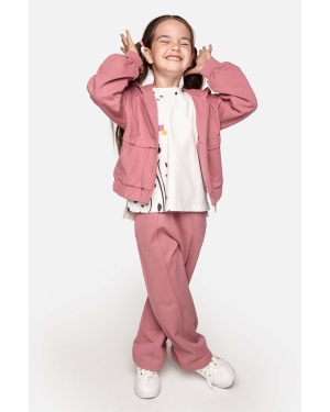 Coccodrillo spodnie dresowe bawełniane dziecięce kolor różowy gładkie