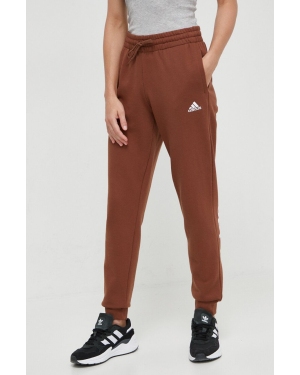 adidas spodnie dresowe bawełniane kolor brązowy z nadrukiem