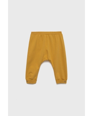United Colors of Benetton spodnie dresowe dziecięce kolor żółty gładkie