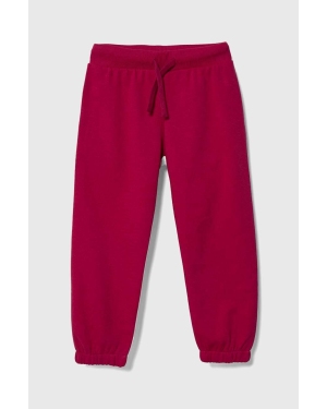 United Colors of Benetton spodnie dresowe dziecięce kolor różowy wzorzyste