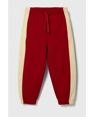 United Colors of Benetton spodnie dresowe bawełniane dziecięce kolor czerwony wzorzyste