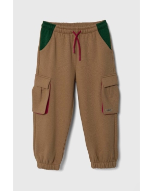 Sisley spodnie dresowe dziecięce kolor beżowy gładkie