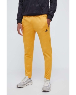 adidas spodnie dresowe kolor żółty wzorzyste