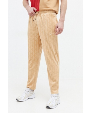 Karl Kani spodnie dresowe kolor beżowy gładkie