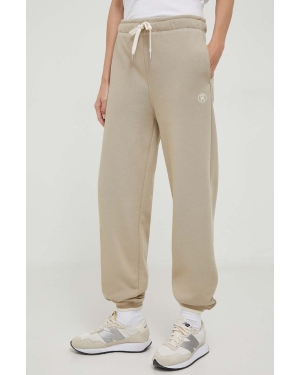 Tommy Hilfiger spodnie dresowe bawełniane kolor beżowy gładkie