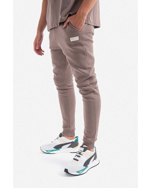 Alpha Industries spodnie dresowe bawełniane kolor beżowy z aplikacją 118366.628-BEZOWY