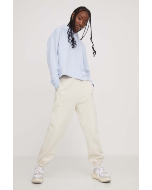 Tommy Jeans spodnie dresowe bawełniane kolor beżowy z aplikacją DW0DW17309