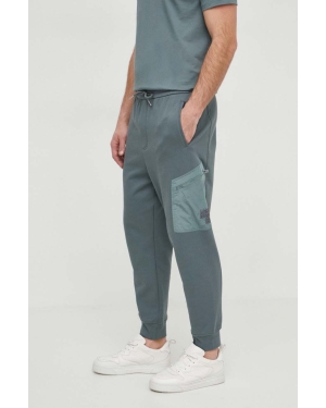 Armani Exchange spodnie dresowe bawełniane kolor zielony gładkie