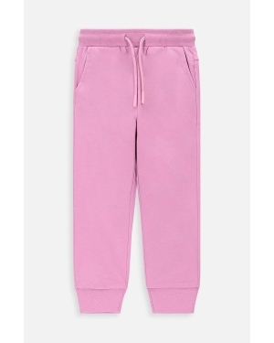 Coccodrillo spodnie dresowe bawełniane dziecięce kolor różowy gładkie
