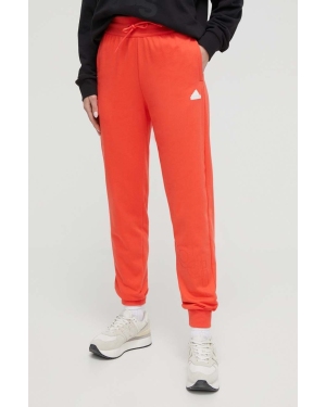 adidas spodnie dresowe kolor czerwony z nadrukiem IS4285