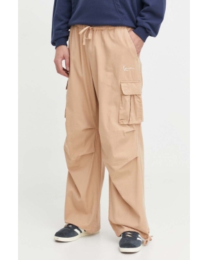 Karl Kani spodnie bawełniane kolor beżowy proste