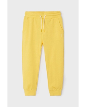 Mayoral spodnie dresowe dziecięce kolor żółty gładkie