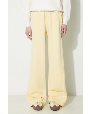 adidas Originals spodnie dresowe bawełniane Essentials+ kolor żółty gładkie IR6020