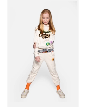 Coccodrillo spodnie dresowe bawełniane dziecięce kolor beżowy z aplikacją