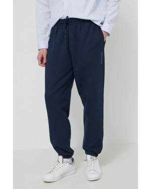 Tommy Jeans spodnie dresowe bawełniane kolor granatowy gładkie