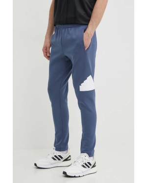 adidas spodnie dresowe kolor niebieski z nadrukiem IR9179