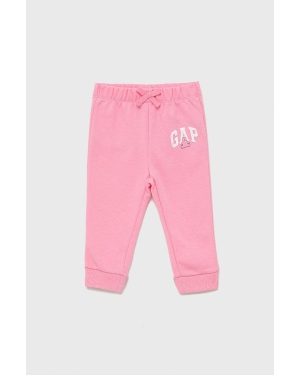 GAP spodnie dziecięce kolor różowy z nadrukiem
