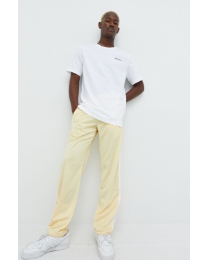 adidas Originals spodnie dresowe męskie kolor żółty gładkie