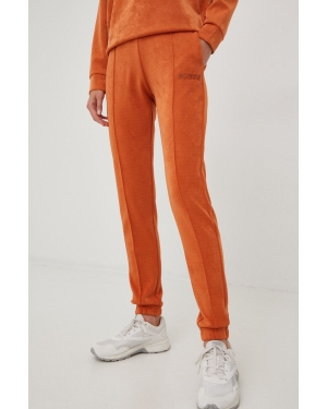 Guess spodnie dresowe damskie kolor pomarańczowy z aplikacją