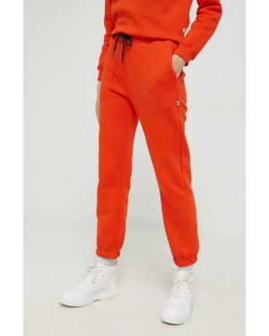 Kangol spodnie dresowe unisex kolor pomarańczowy gładkie