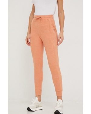 Rip Curl spodnie dresowe damskie kolor pomarańczowy gładkie