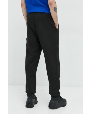 Tommy Jeans spodnie dresowe bawełniane męskie kolor czarny gładkie